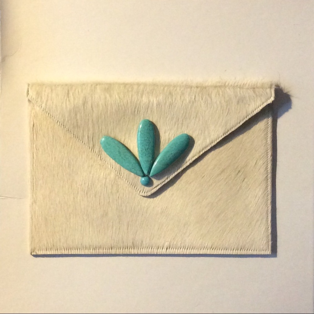 Cream color clutch